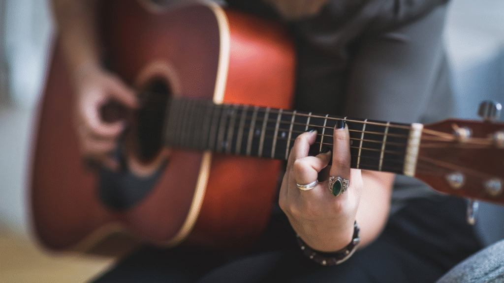 A guitar player playing chords