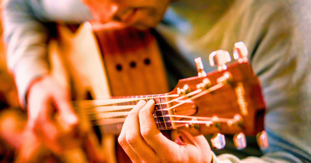 The guitarist plays the guitar